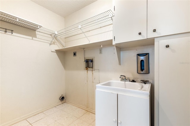 3242 Nocturne Rd, Venice, FL 34293 - laundry room featuring cabinet space, electric dryer hookup, and washer hookup