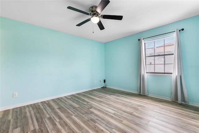 3242 Nocturne Rd, Venice, FL 34293 - empty room featuring wood finished floors and a ceiling fan