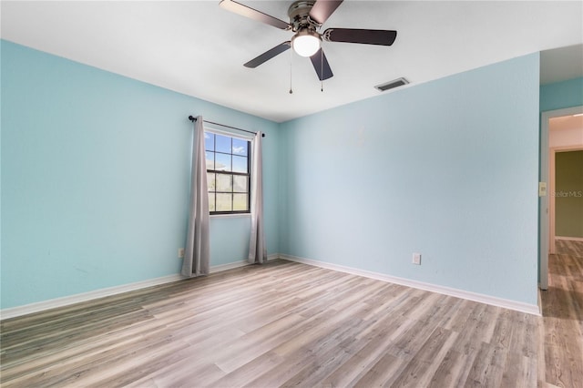 3242 Nocturne Rd, Venice, FL 34293 - empty room featuring wood finished floors and a ceiling fan