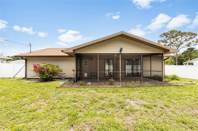 3242 Nocturne Rd, Venice, FL 34293 - rear view of property with a sunroom and a fenced backyard