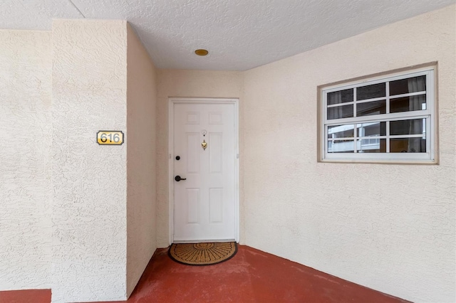 3730 Cadbury Cir Unit 616, Venice, FL 34293 - view of exterior entry featuring stucco siding