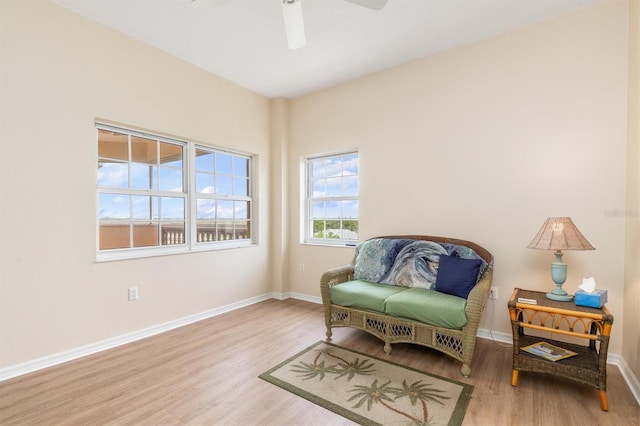 3730 Cadbury Cir Unit 616, Venice, FL 34293 - living area with wood finished floors, baseboards, and ceiling fan