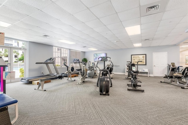 3730 Cadbury Cir Unit 616, Venice, FL 34293 - workout area with carpet flooring, baseboards, french doors, and a drop ceiling