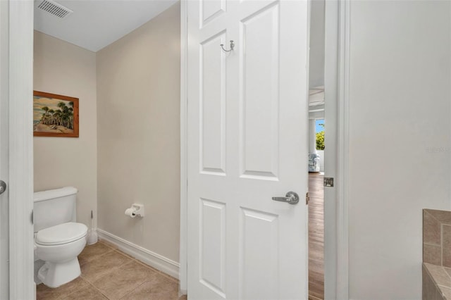 90 Vivante Blvd Unit 202, Punta Gorda, FL 33950 - bathroom with toilet and tile patterned flooring
