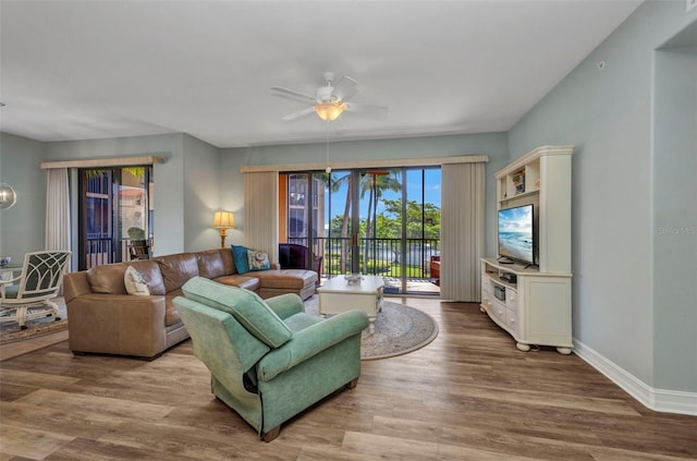 90 Vivante Blvd Unit 202, Punta Gorda, FL 33950 - living area with a ceiling fan and wood finished floors