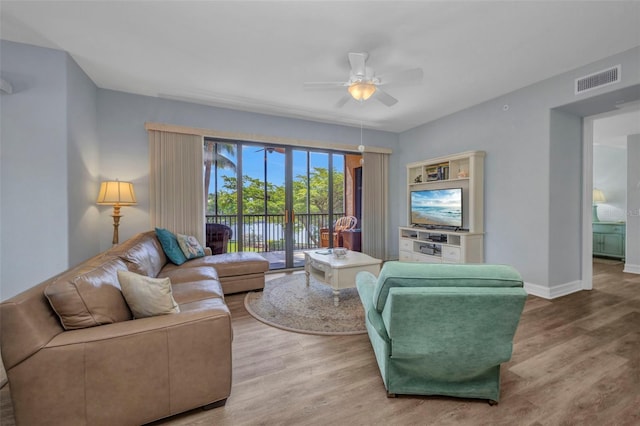 90 Vivante Blvd Unit 202, Punta Gorda, FL 33950 - living area with wood finished floors and ceiling fan