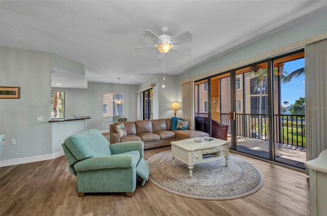 90 Vivante Blvd Unit 202, Punta Gorda, FL 33950 - living area with wood finished floors and a ceiling fan