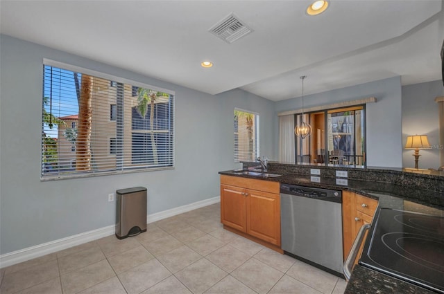 90 Vivante Blvd Unit 202, Punta Gorda, FL 33950 - kitchen with stainless steel dishwasher, range with electric cooktop, a chandelier, hanging light fixtures, and recessed lighting