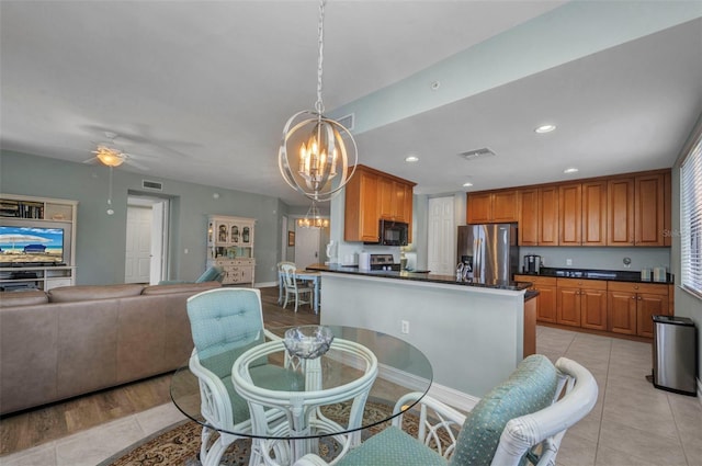 90 Vivante Blvd Unit 202, Punta Gorda, FL 33950 - dining space with a chandelier, a ceiling fan, light tile patterned flooring, and recessed lighting
