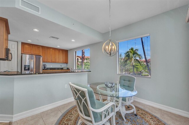 90 Vivante Blvd Unit 202, Punta Gorda, FL 33950 - dining room with a chandelier, recessed lighting, and light tile patterned floors