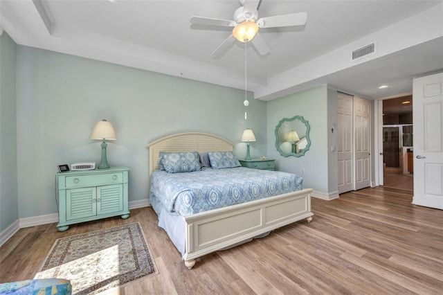90 Vivante Blvd Unit 202, Punta Gorda, FL 33950 - bedroom featuring wood finished floors, recessed lighting, and ceiling fan