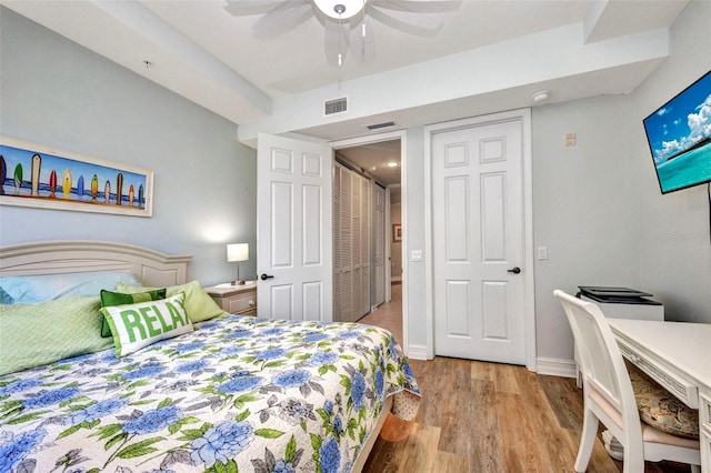 90 Vivante Blvd Unit 202, Punta Gorda, FL 33950 - bedroom with wood finished floors and ceiling fan