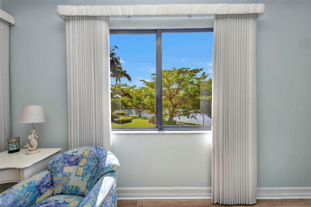 90 Vivante Blvd Unit 202, Punta Gorda, FL 33950 - sitting room featuring wood finished floors