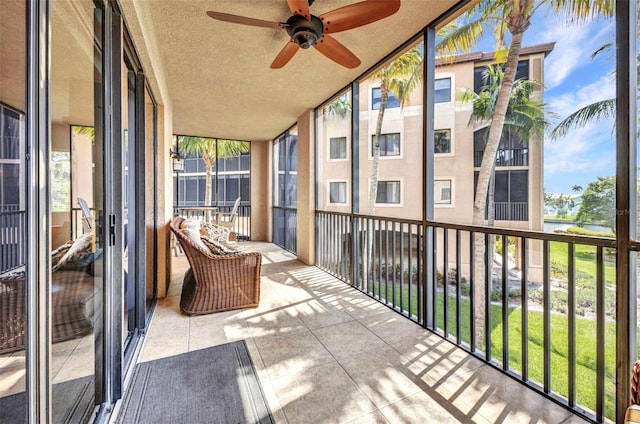 90 Vivante Blvd Unit 202, Punta Gorda, FL 33950 - sunroom / solarium with ceiling fan and a water view