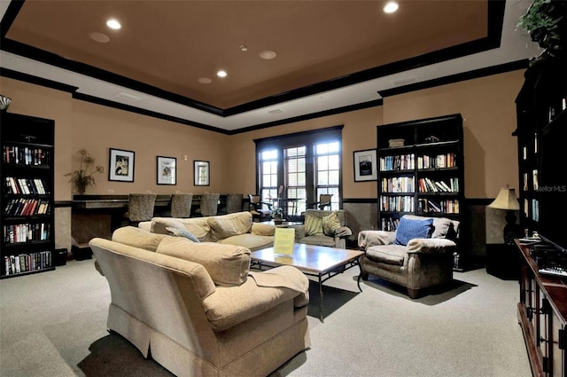 90 Vivante Blvd Unit 202, Punta Gorda, FL 33950 - carpeted living area with a tray ceiling, recessed lighting, and crown molding