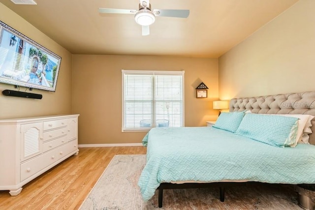 7424 Acorn Blvd, Punta Gorda, FL 33982 - bedroom featuring light wood-style flooring, baseboards, and ceiling fan