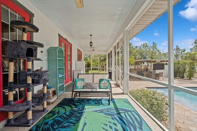7424 Acorn Blvd, Punta Gorda, FL 33982 - sunroom / solarium featuring a ceiling fan, french doors, and an outdoor hangout area