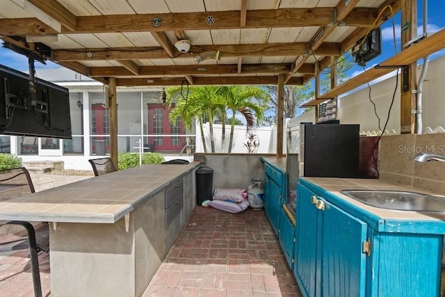 7424 Acorn Blvd, Punta Gorda, FL 33982 - view of patio / terrace with exterior kitchen