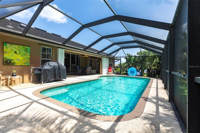 17150 Sarong Ln, Punta Gorda, FL 33955 - swimming pool featuring a patio area, a grill, and a lanai