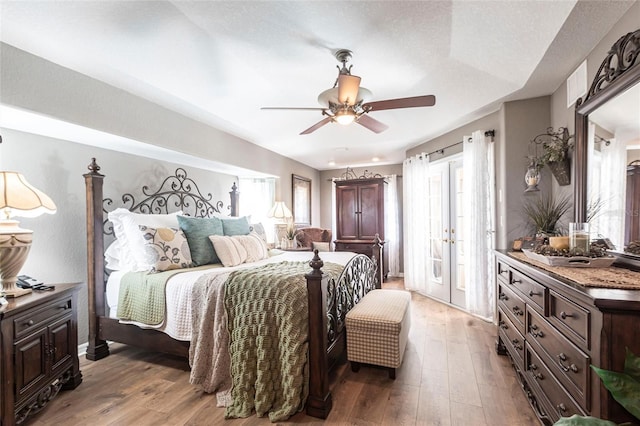 17150 Sarong Ln, Punta Gorda, FL 33955 - bedroom with hardwood / wood-style floors, ceiling fan, and french doors