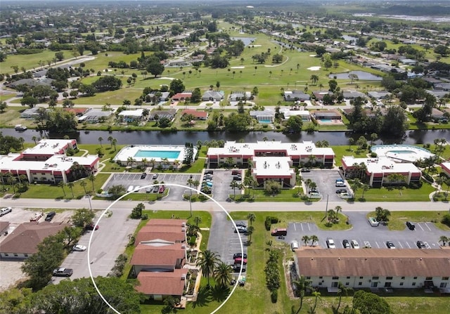 93 Boundary Blvd Unit 303, Rotonda West, FL 33947 - drone / aerial view of a large body of water and a golf club