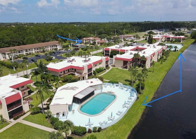 93 Boundary Blvd Unit 303, Rotonda West, FL 33947 - bird's eye view of a pool area