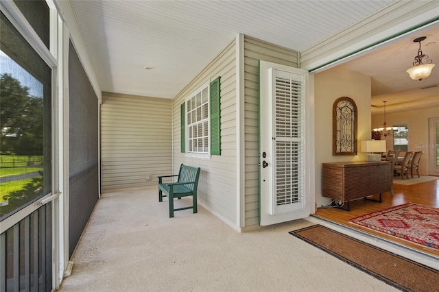 5221 Blackjack Cir, Punta Gorda, FL 33982 - sunroom / solarium featuring a chandelier