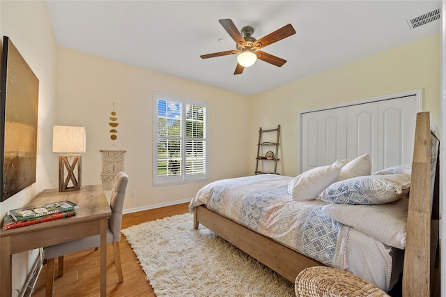 5221 Blackjack Cir, Punta Gorda, FL 33982 - bedroom with wood finished floors, ceiling fan, and a closet