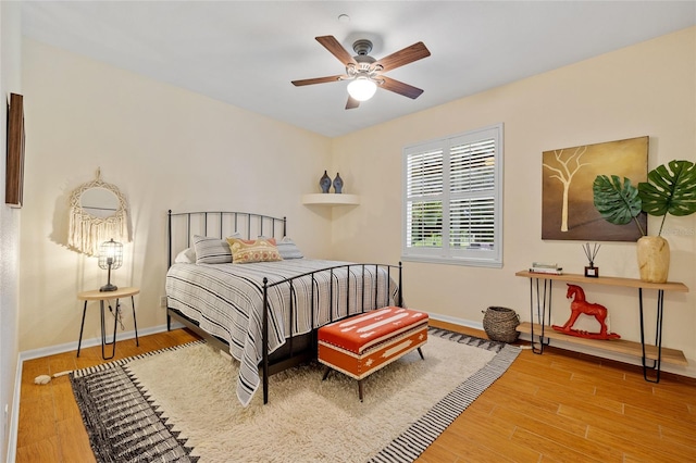 5221 Blackjack Cir, Punta Gorda, FL 33982 - bedroom with wood finished floors and ceiling fan