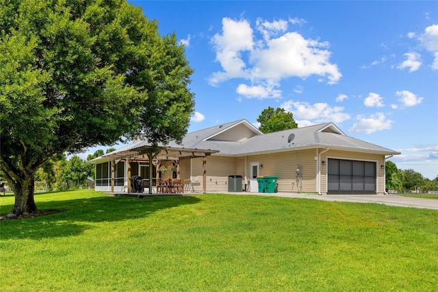 5221 Blackjack Cir, Punta Gorda, FL 33982 - ranch-style house featuring an attached garage, driveway, a front yard, and a metal roof