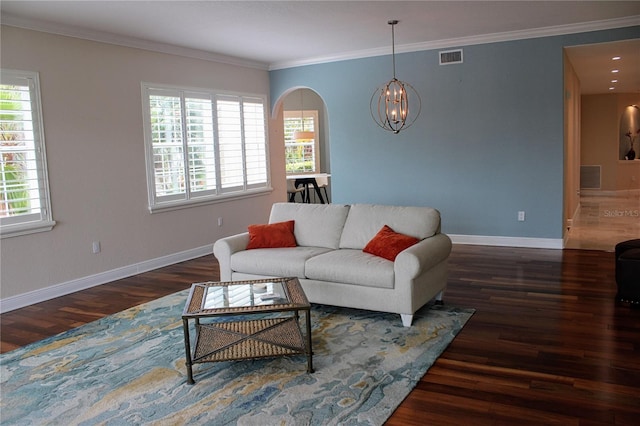2630 Tarpon Cove Dr Unit 212, Punta Gorda, FL 33950 - living area with wood finished floors, arched walkways, baseboards, a chandelier, and ornamental molding