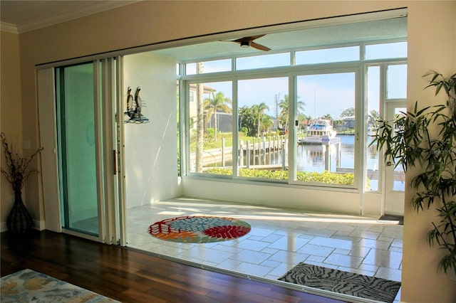 2630 Tarpon Cove Dr Unit 212, Punta Gorda, FL 33950 - entryway with crown molding, a water view, and ceiling fan