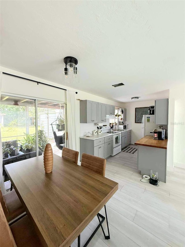 22334 Augusta Ave, Port Charlotte, FL 33952 - dining space with healthy amount of natural light