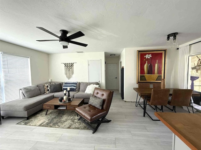 22334 Augusta Ave, Port Charlotte, FL 33952 - living area featuring a ceiling fan