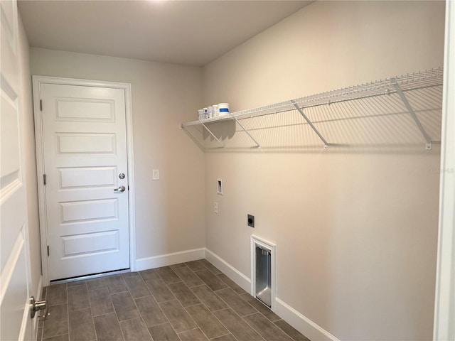 10023 Greetings St, Port Charlotte, FL 33981 - laundry area featuring hookup for a washing machine, hookup for an electric dryer, and dark wood finished floors
