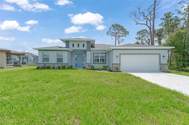 2138 Blaser St, Punta Gorda, FL 33980 - prairie-style home with stucco siding, an attached garage, driveway, and stone siding