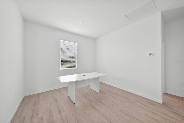 2138 Blaser St, Punta Gorda, FL 33980 - unfurnished office featuring light wood-style floors and attic access