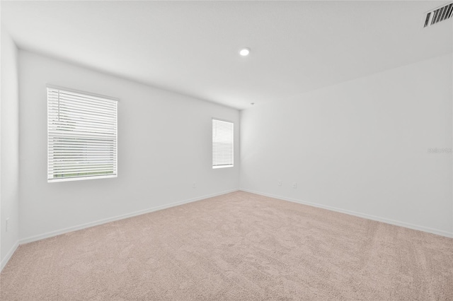 2138 Blaser St, Punta Gorda, FL 33980 - spare room with light colored carpet and recessed lighting