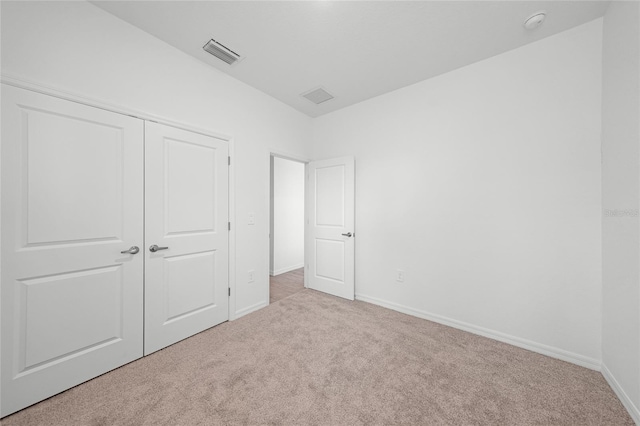 2138 Blaser St, Punta Gorda, FL 33980 - unfurnished bedroom with carpet and a closet