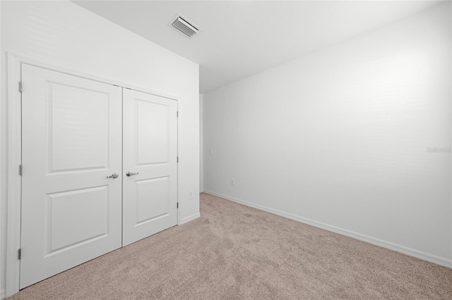 2138 Blaser St, Punta Gorda, FL 33980 - unfurnished bedroom with carpet and a closet