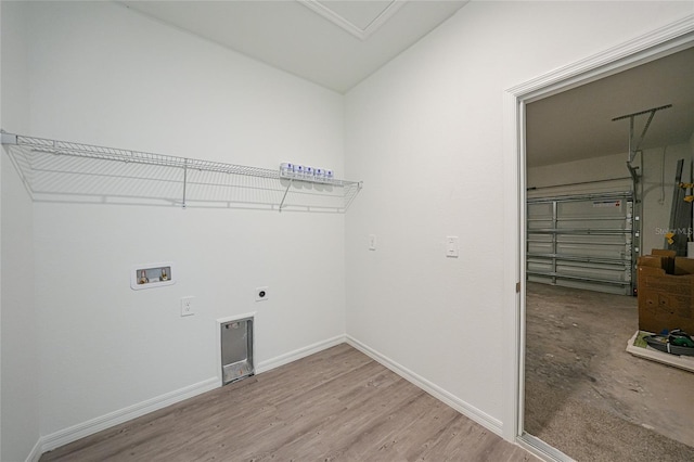 2138 Blaser St, Punta Gorda, FL 33980 - washroom with hookup for a washing machine, electric dryer hookup, and wood finished floors