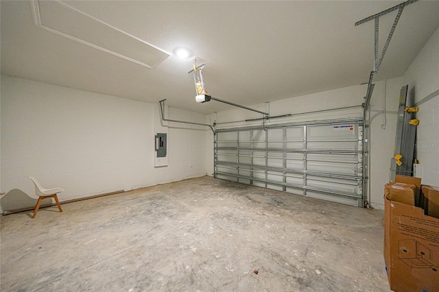2138 Blaser St, Punta Gorda, FL 33980 - garage with a garage door opener, concrete block wall, and electric panel