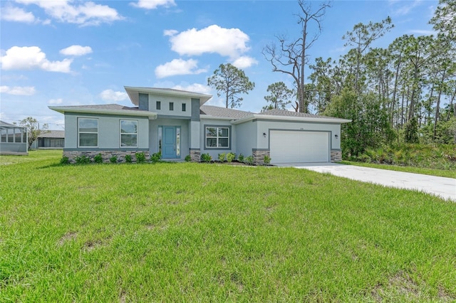 2138 Blaser St, Punta Gorda, FL 33980 - prairie-style home with stucco siding, an attached garage, driveway, stone siding, and a front yard