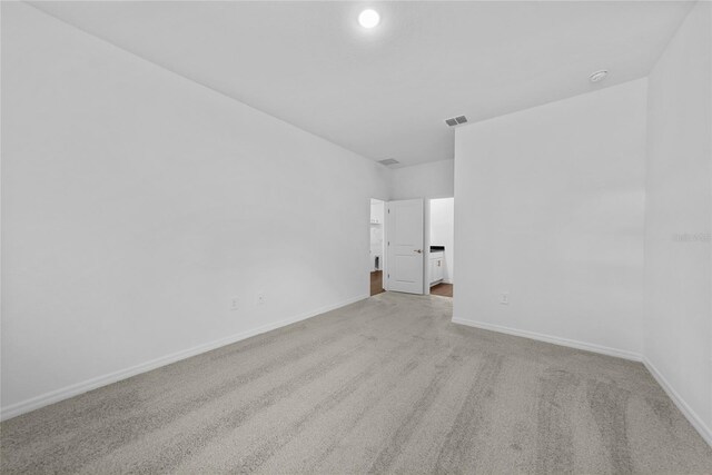 7345 Ellis Ln, Port Charlotte, FL 33981 - carpeted empty room featuring baseboards