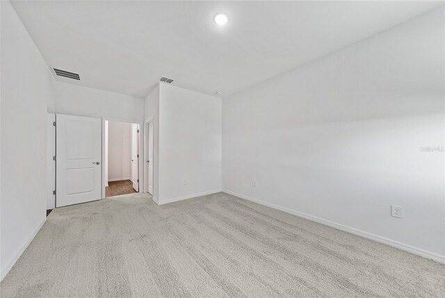 7345 Ellis Ln, Port Charlotte, FL 33981 - spare room with baseboards and carpet floors