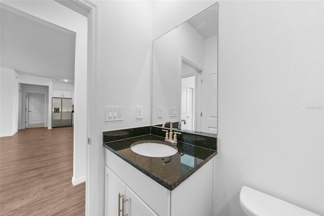 7345 Ellis Ln, Port Charlotte, FL 33981 - bathroom with vanity and wood finished floors