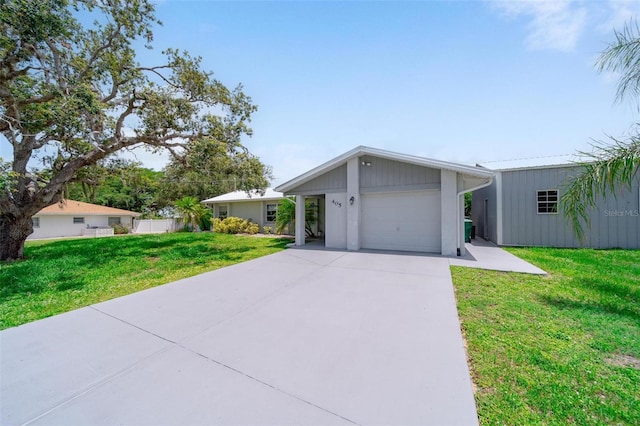 405 Ridgecrest Dr, Punta Gorda, FL 33982 - view of front of home with a front lawn, driveway, and a garage