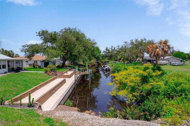 405 Ridgecrest Dr, Punta Gorda, FL 33982 - dock with a water view and a yard