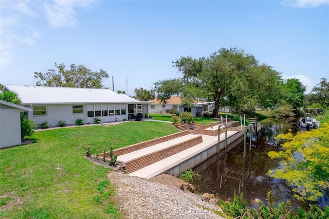 405 Ridgecrest Dr, Punta Gorda, FL 33982 - dock featuring a lawn and a water view