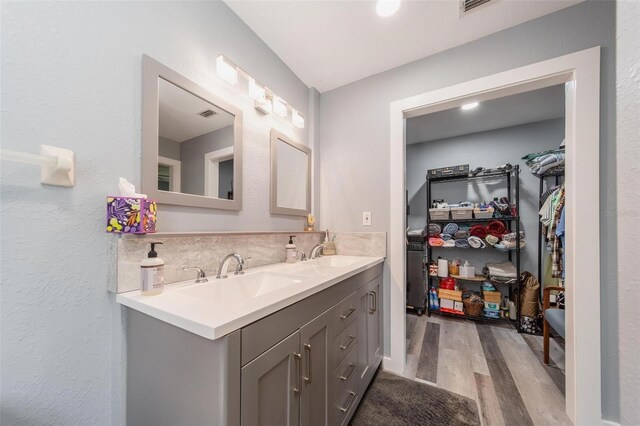 405 Ridgecrest Dr, Punta Gorda, FL 33982 - full bath featuring double vanity and wood finished floors